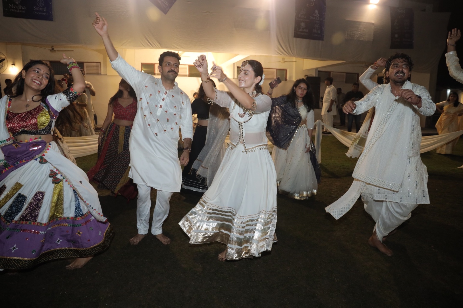Couple dancing in white